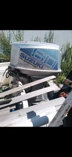 R16k. Dory Bass boat on trailer.  60 hp Suzuki outboard. Call Anjé 071 296 1465