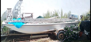 R16k. Dory Bass boat on trailer.  60 hp Suzuki outboard. Call Anjé 071 296 1465