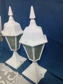 Pair of metal lanterns