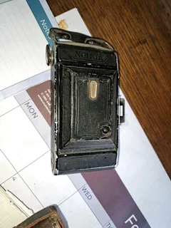 2x antique camera