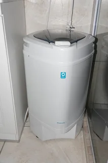 Washing machine and spinner