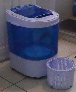 Washing machine and spinner