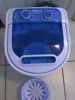 Washing machine and spinner