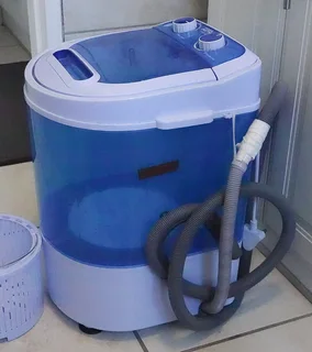 Washing machine and spinner