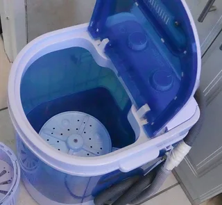 Washing machine and spinner