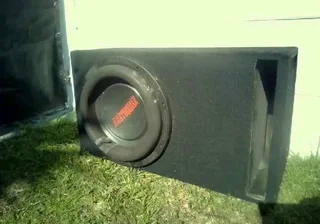 15" earthquake sub woofer 1500W in box Got a hole in but doesn't seem to effect the speaker