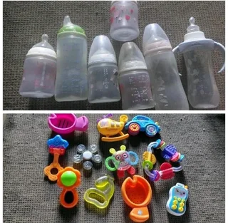 7 baby bottles with toysSecondhand good conditionR199 for all(6 bottles is nuk, 1 plain)