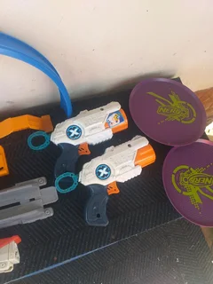 Hotwheel track parts and nerf guns with parts All as is for R199