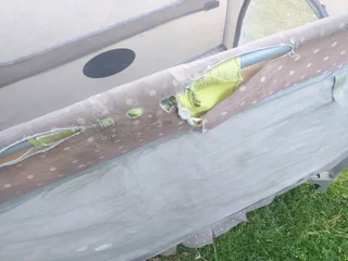 Cot Secondhand (some tears) No mattress etc and needs a clean R95