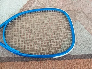 Racket 47cm long x 19cm wide R99