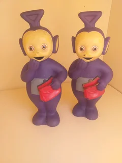 Vintage Tinky Winky Teletubbies figure, likely from the 1990s R299 for both