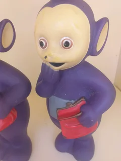 Vintage Tinky Winky Teletubbies figure, likely from the 1990s R299 for both