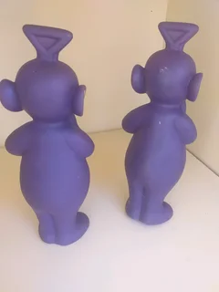 Vintage Tinky Winky Teletubbies figure, likely from the 1990s R299 for both