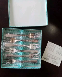Set of six silver-plated forks in their original packaging