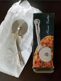 Vintage Silver Plated Pizza Cutter R149The item measures 19cm