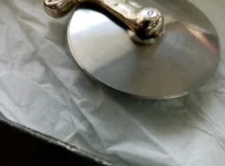 Vintage Silver Plated Pizza Cutter R149The item measures 19cm