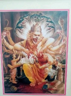 Lord Narasimha Photographic Print in a frame28,5cm x 33,5cm (wooden frame with glass front)