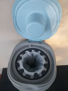 Blue Tommee Tippee Nappy bin Has some bags in Needs a refill soon R149