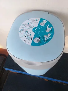 Blue Tommee Tippee Nappy bin Has some bags in Needs a refill soon R149