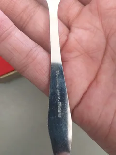 boxed set of a tea strainer with a porcelain bowl and a matching spoon &#34;Novalux Plate&#34;