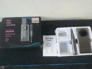 Nail Drill machine Working condition (no attatchments and it needs power supplies plugs)