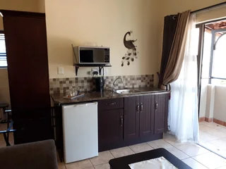 Fully furnished accommodation, available on a monthly basis, in Lynnwood Ridge, Pretoria East.