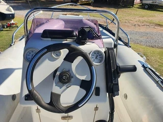 INFANTA 5.2 WITH 115HP MERCURY OUTBOARD MOTOR.