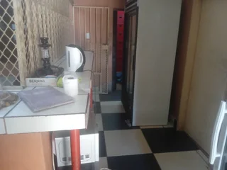 BOTTLE STORE AND GENERAL DEALER