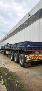 Afrit triaxel dropside trailer