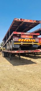 Triaxel flat deck trailers for sale