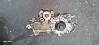 Jaguar Xtype X400 2.1Petrol Waterpump, Complete with water pump housing. In good working condition.