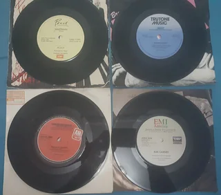 16 7&#34; Vinyl Records w/Original Sleeves