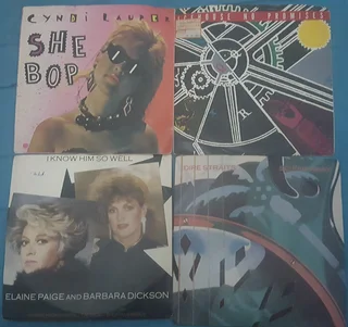 16 7&#34; Vinyl Records w/Original Sleeves