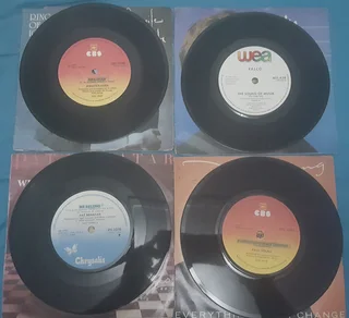 16 7&#34; Vinyl Records w/Original Sleeves
