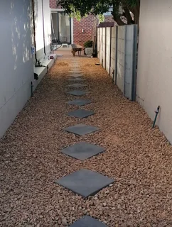 Bricks paving// artificial grass and decorative stones pebbles