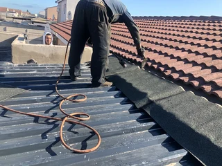 Waterproofing torch on roof repair leaks