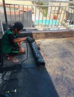 Seamless gutters// roof repair waterproofing torch on