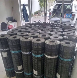 Seamless gutters// roof repair waterproofing torch on