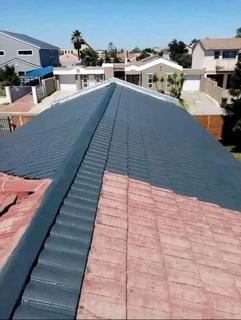 Seamless gutters // painting and roof repair leaks torch on waterproofing