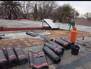 Waterproofing torch on roof repair leaks and cracks