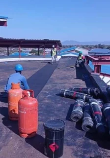 Waterproofing torch on roof repair leaks and cracks