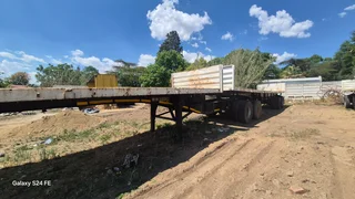 Hook and go Superlink flat deck trailers