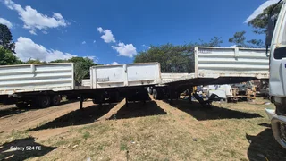 Hook and go Superlink flat deck trailers