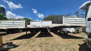 Hook and go Superlink flat deck trailers