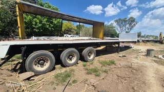 Quick sale for a tri excel flat deck trailer