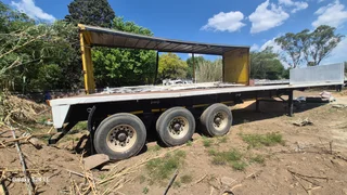 Quick sale for a tri excel flat deck trailer