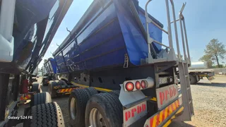 Hook and go Afrit side tipper trailer