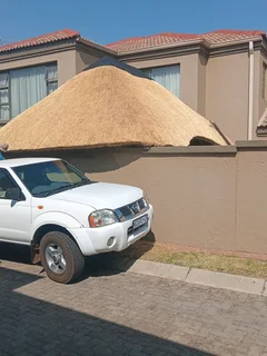 Enock Thatching