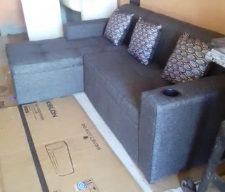 Brand new Charcoal Grey L-Shape Couch with 3scatter cushions and cupholder on sale @ R2999