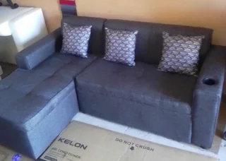 Brand new Charcoal Grey L-Shape Couch with 3scatter cushions and cupholder on sale &#64; R2999